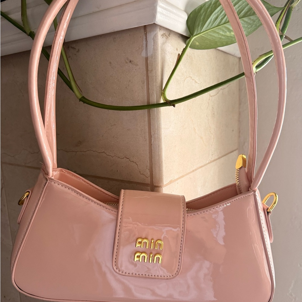 Stylish Pink Shoulder Bag with Gold Accents